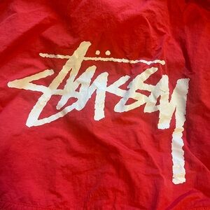 Stussy x Nike Men’s Red Graphic Windbreaker
